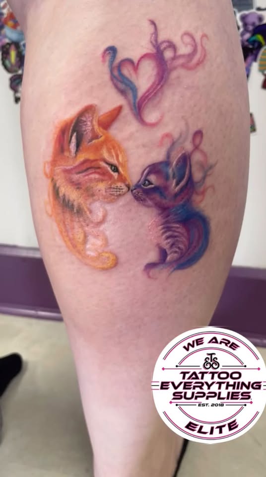 Colourful watercolour style kitten tattoo